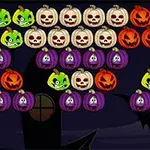 Halloween Shooter Igra sa temom Noći veštica u kojoj su prikazane bundeve i duhovi različitih boja poredani kao u igrici spajanje tri ista